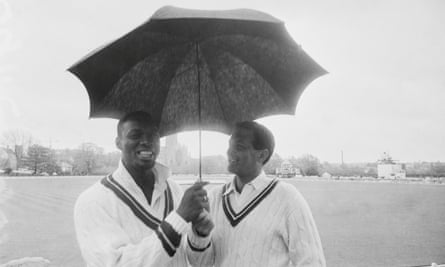 Wes Hall stands alongside Basil D’Oliveira during a tour game between the West Indies and Worcestershire in May 1966.