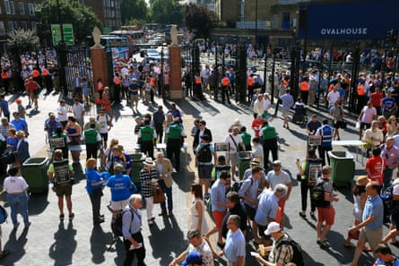 Fans make their way through the Hobbs Gate into the Oval.