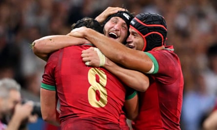 Portugal players show their delight after beating Fiji.