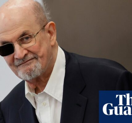 Rushdie's memoir discussing the stabbing incident may potentially cause a postponement of the accused attacker's trial.