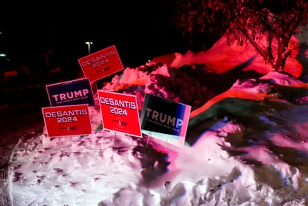 Campaign signs in a snow bank