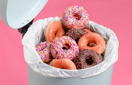 Heap of donuts in the kitchen bin