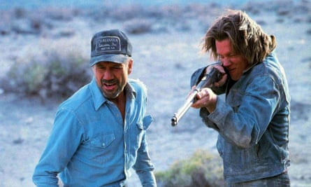 Fred Ward and Kevin Bacon in Tremors on Comedy Central.