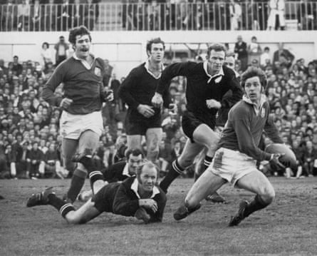 Barry John of the British & Irish Lions bursts away from New Zealand’s Sid Going during the 1971 Lions tour