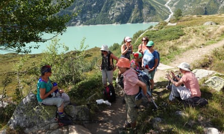 Members of the KlimaSeniorinnen stopping to rest during a hike.