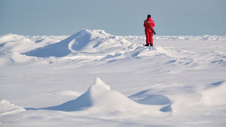 An armed guard on the Arctic ice.