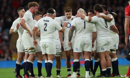 England captain Jamie George talks to his players during an injury break in the Six Nations match against Wales.