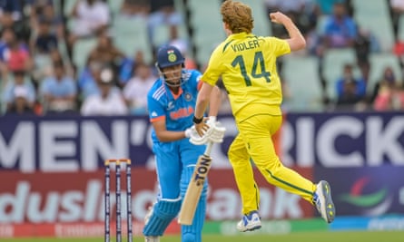 Arshin Atul Kulkarni (left) nicks the ball and is caught out behind as Callum Vidler celebrates during the ICC U19 men's Cricket World Cup final between India and Australia in Benoni, South Africa on 11 February 2024