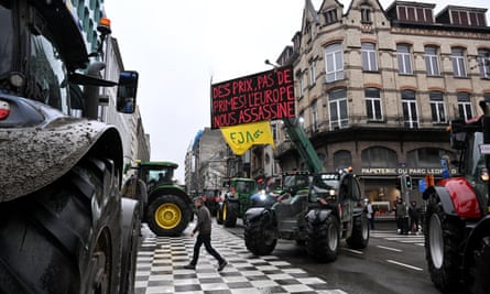 EU agriculture leaders convene in Brussels while farmers engage in a confrontation with riot police.