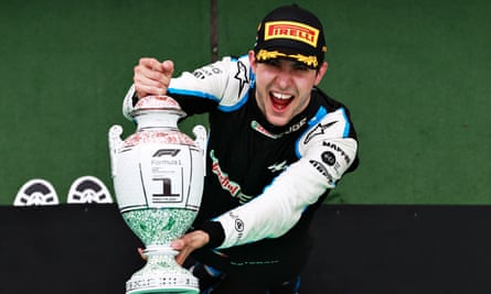 Esteban Ocon celebrates with the trophy at the Hungarian Grand Prix in 2021 