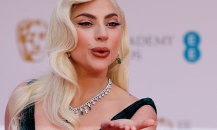 US actress and singer Lady Gaga poses on the red carpet upon arrival at the BAFTA British Academy Film Awards at the Royal Albert Hall, in London.