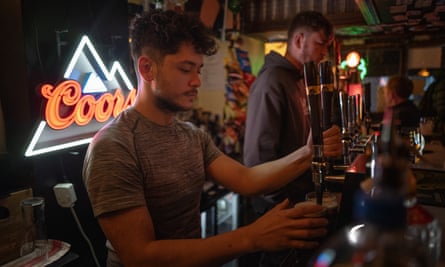 Kai and John working behind the bar at the Toucan, one of London's most famous Guinness pubs.