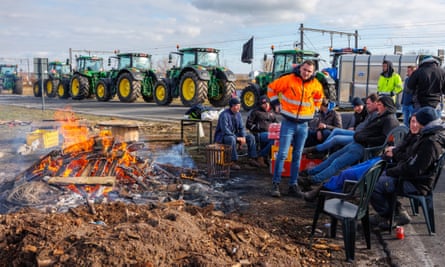 Belgian farmers block the access roads to the port in Zeebruge.