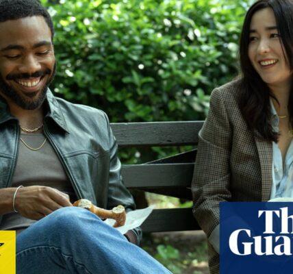 The romance between Donald Glover and Maya Erskine in "Mr & Mrs Smith" enhances the universe.