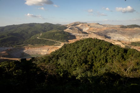 A huge gold mine within a forested landscape
