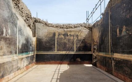 Banquet room with preserved frescoes unearthed among Pompeii ruins