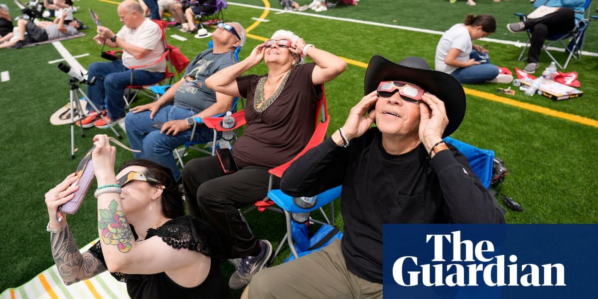 Millions watch as total solar eclipse sweeps across Mexico, US and Canada – video