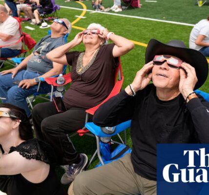 Millions watch as total solar eclipse sweeps across Mexico, US and Canada – video