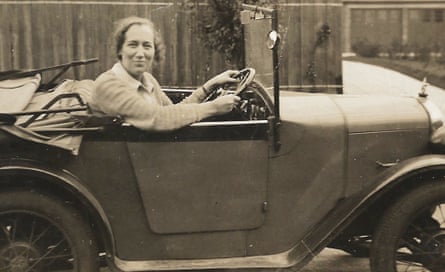 Brynnie Granger at the wheel of a 1930s car.