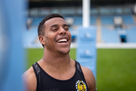 Immanuel Feyi-Waboso smiles as he poses for a photo at Sandy Park in Exeter.