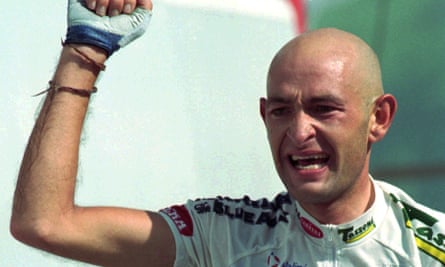 Marco Pantani of Italy waves a clenched fist after he winning a stage in the Tour de France