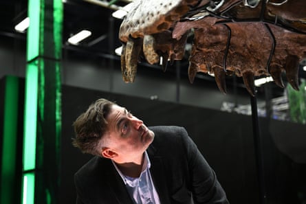Dr Erich Fitzgerald with Victoria the T rex