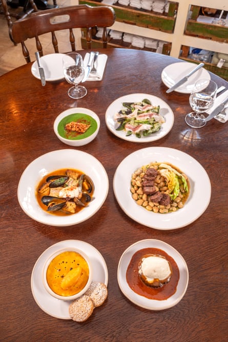 A table at Wild Flor restaurant covered in dishes ffrom its three-course lunch.