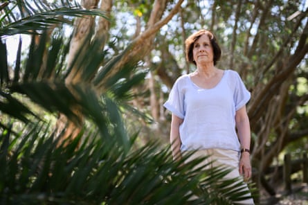Lesley Hughes in a park with vegetation around her