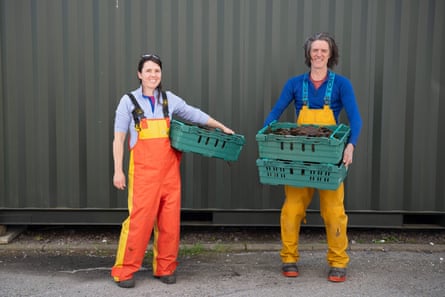 Kyla Orr and Alex Glasgow bring their crop to Eco Cascade for processing.