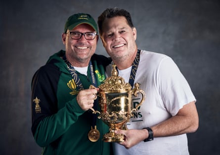 South Africa’s World Cup winning Head Coach Jacques Nienaber and Coach Rassie Erasmus pose with the Webb Ellis Cup after the Rugby World Cup final victory over New Zealand in October 2023.
