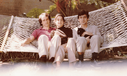 Family snap of a young Griffin, right, with brother Alex and sister Dominique sitting in a hammock.